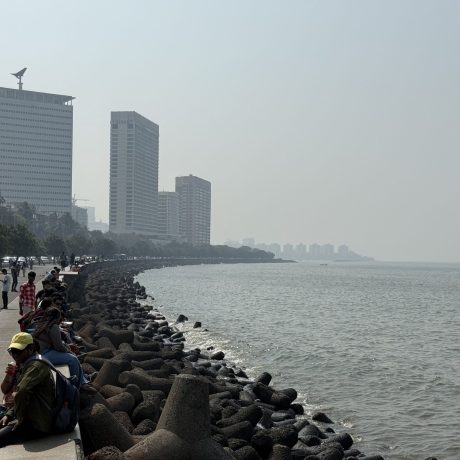 H3 Act 1 Pic 3- people-sitting-along-the-marine-drive-promenade-overlooking-the-arabian-sea-during-the-mumbai-full-day-tour (1)