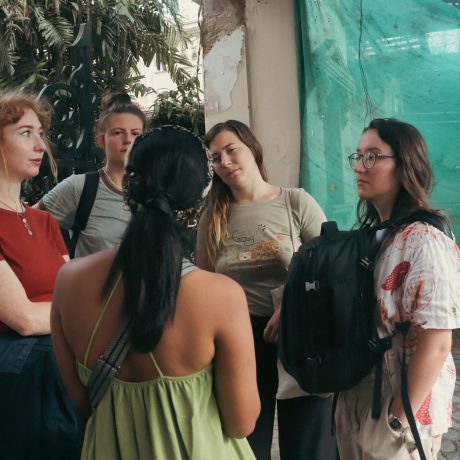 h3-intro-local-female-guide-conducting-an-evening-orientation-with-four-female-foreign-tourists-outside-the-oberoi-grand-before-starting-the-kolkata-street-food-and-night-tour (1)